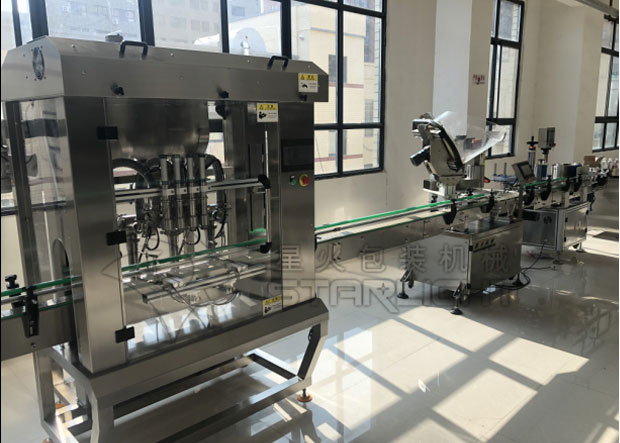 星火辣椒醬灌裝封口機械設備展示